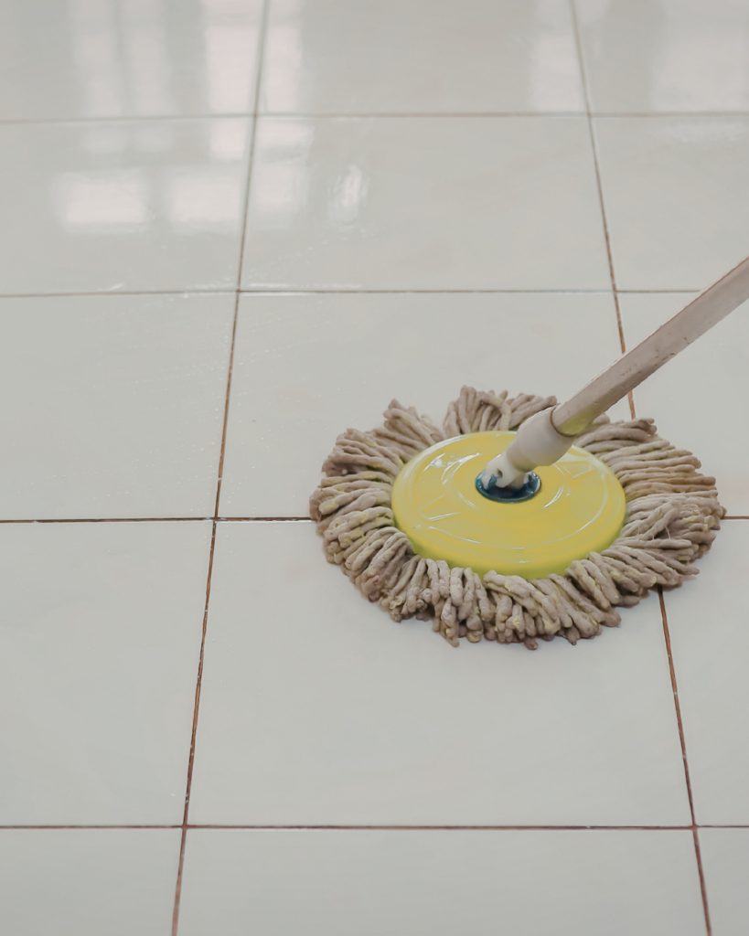 floor tile cleaning with mop removing dirt from tiles in Queensland