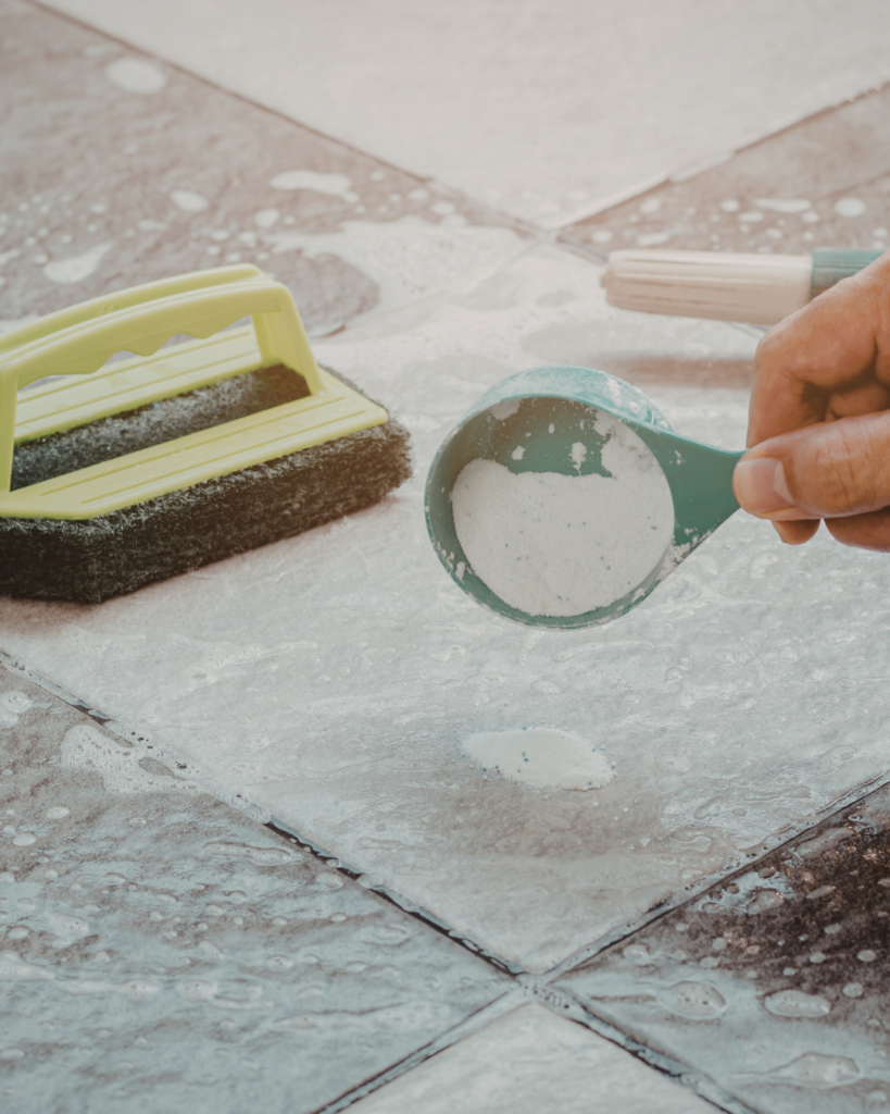 removing stains from tile surface using cleaning solution in Queensland